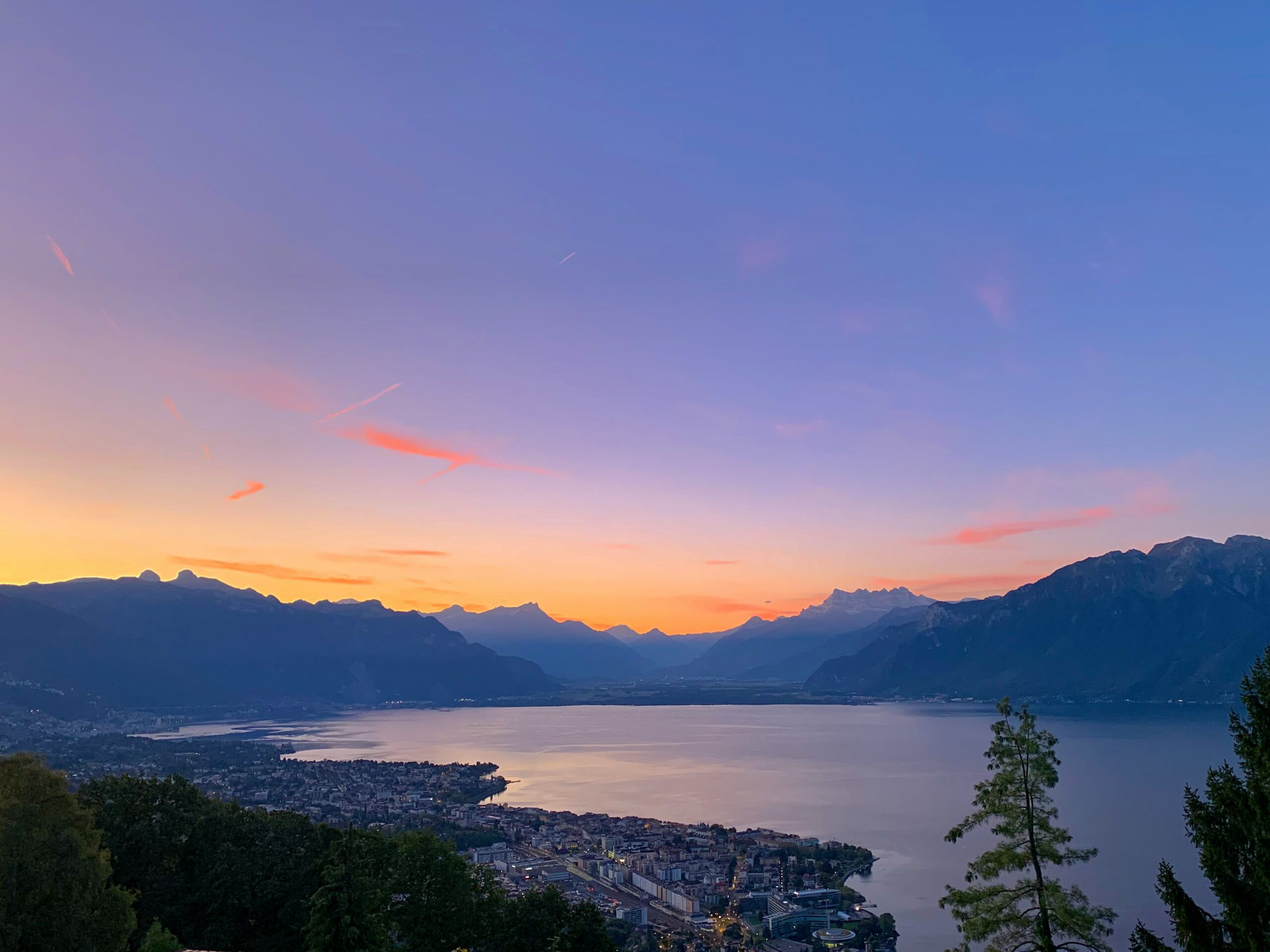 Aireal view of Lake Geneva and the alps during sunset